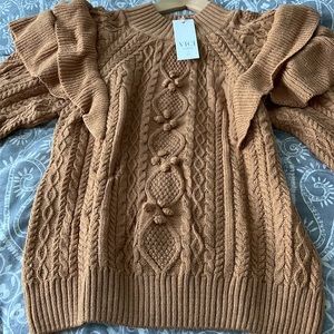 Ruffle shoulder cable knit sweater